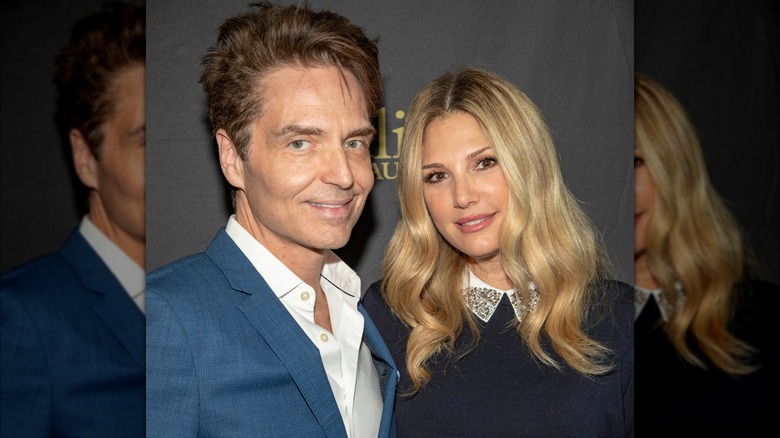 Richard Marx and Daisy Fuentes posing at Julien's Auctions in Beverly Hills