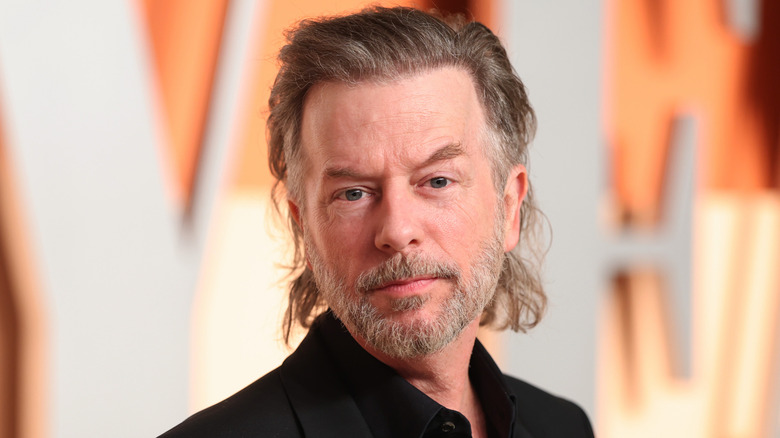 David Spade posing at the Vanity Fair Oscar Party