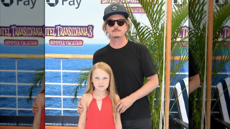 David Spade and his daughter Harper Spade posing at the Regency Village Theater