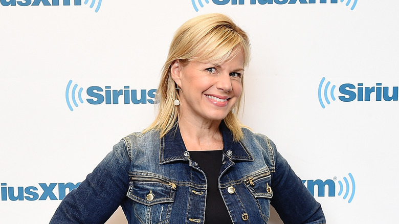 Gretchen Carlson smiling while posing at SiriusXM studios