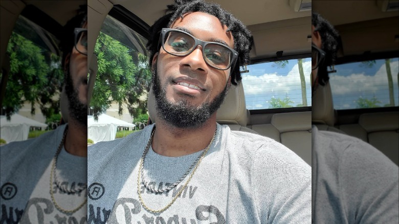 Marcus Hamilton smiling glasses
