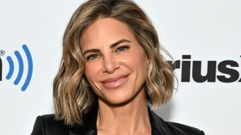 Jillian Michaels smiling on a Sirius XM step and repeat