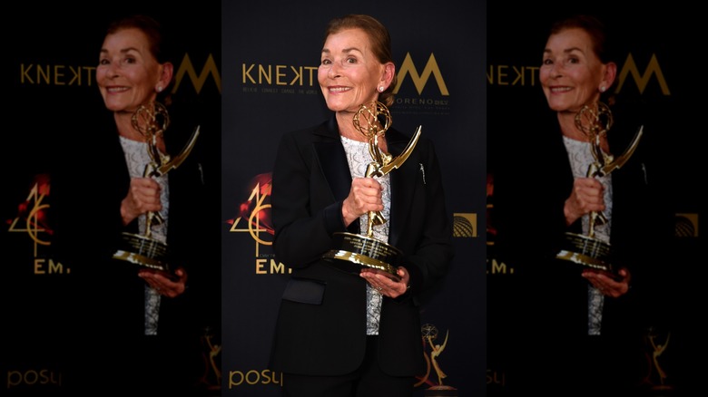 Judge Judy holding her Emmy in 2022