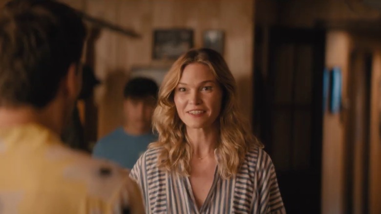Julia Stiles as Maisy-May smiling awkwardly on The Lake