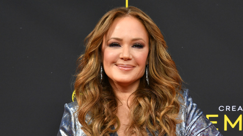 Leah Remini smiling at the Creative Arts Emmy Awards event