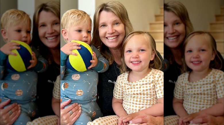 Missy Robertson posing with her grandkids
