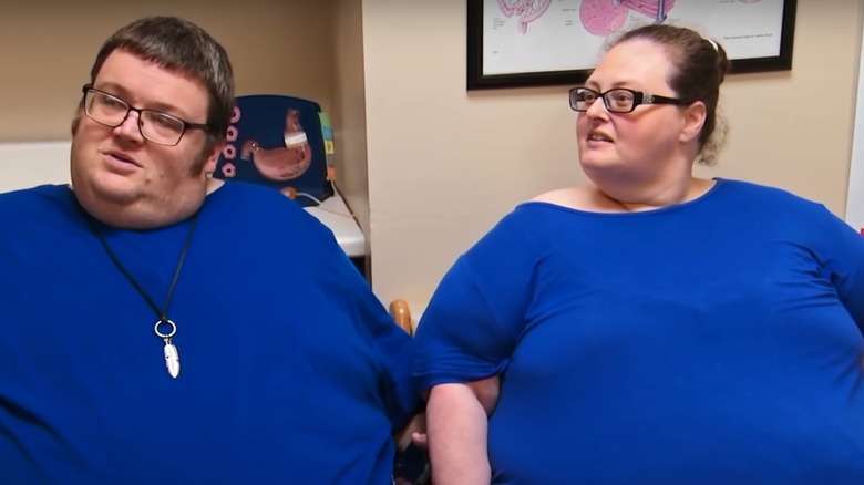 Nathan and Amber Prater wearing blue shirts