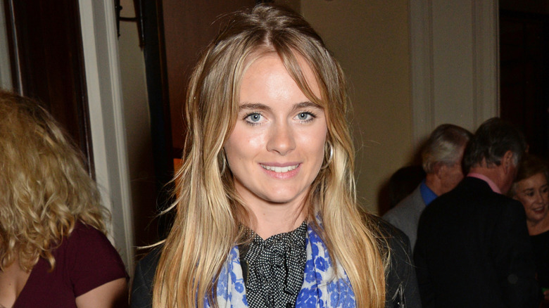 Closeup of Cressida Bonas smiling in crowded room