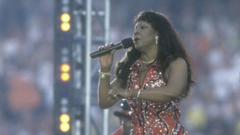 Martha Reeves singing at the Super Bowl XXXII halftime show