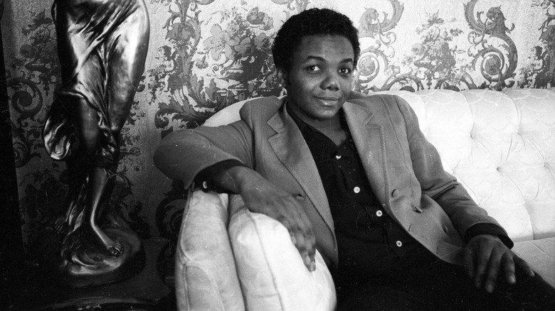 Lamont Dozier sitting on a couch