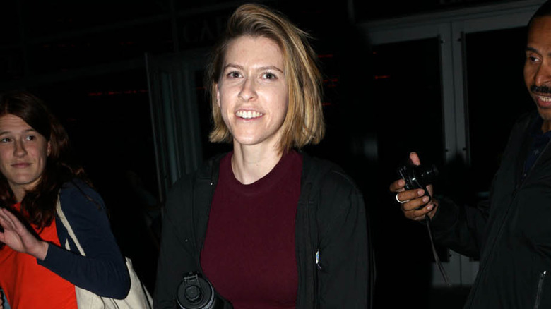 Eden Sher smiling at event