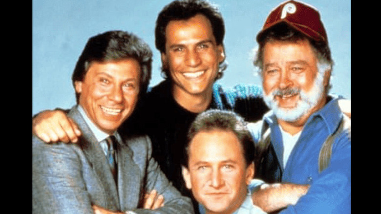 The main cast of Brothers smiling in a promotional photo.