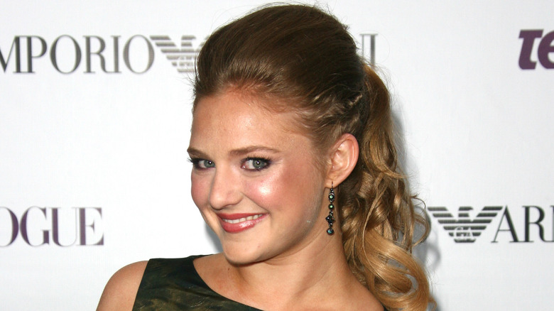 Kaitlyn Jenkins smiling in formalwear