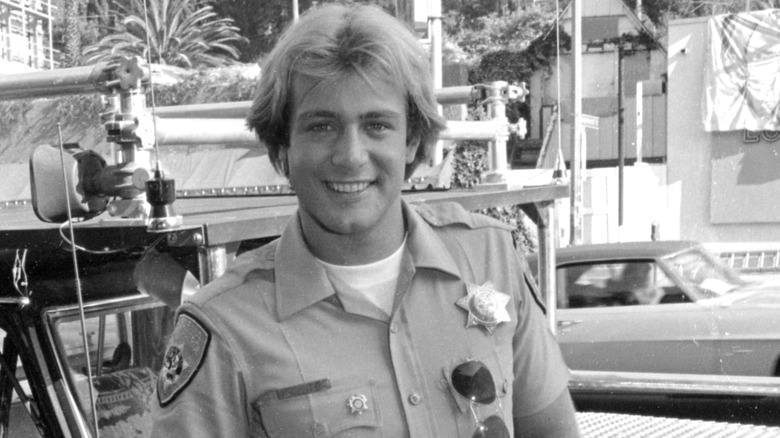 Tom Reilly smiling on the set of "CHiPs" in 1982.