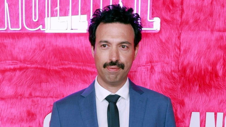 Alex Karpovsky posing on the red carpet in 2022