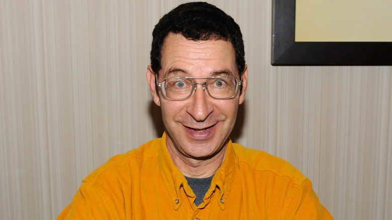 Eddie Deezen wearing orange