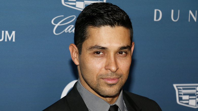 Wilmer Valderrama wearing a suit
