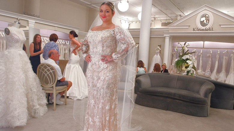 Elle King posing in her wedding dress on "Say Yes to the Dress"