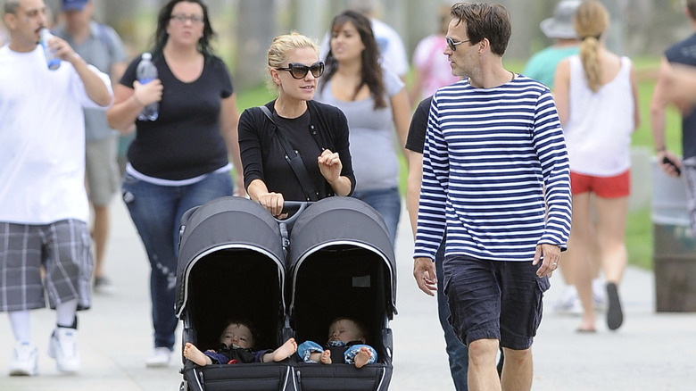 Anna Paquin and Stephen Moyer taking a stroll with their twins in 2013