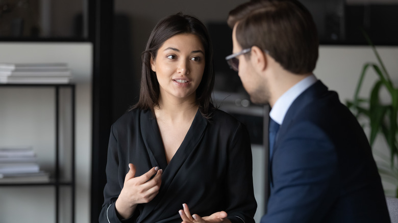 Woman talking to her boss