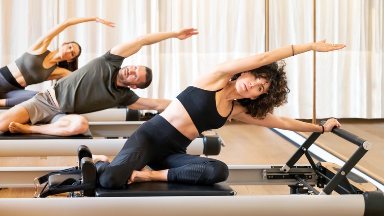 People working out in a Pilates class