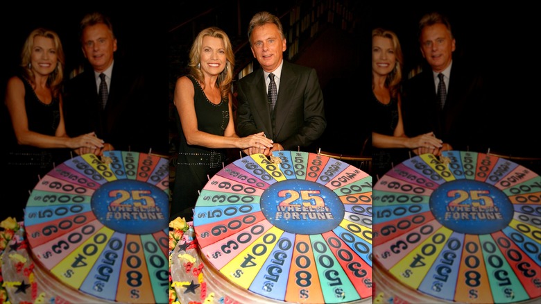 Vanna White and Pat Sajak posing at the 25th anniversary party