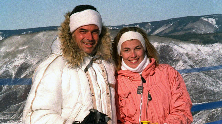 A young Vanna White and her former husband smile posing while skiing on mountains