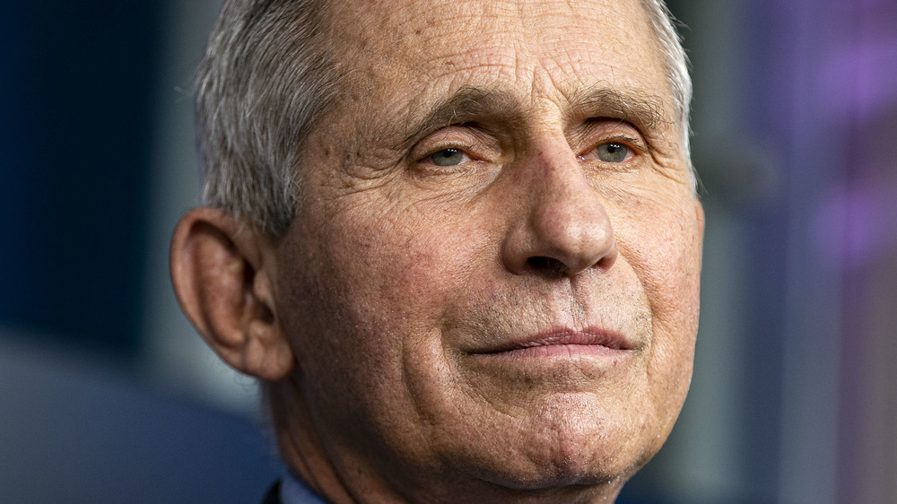 Dr. Anthony Fauci listening to President Biden Speak