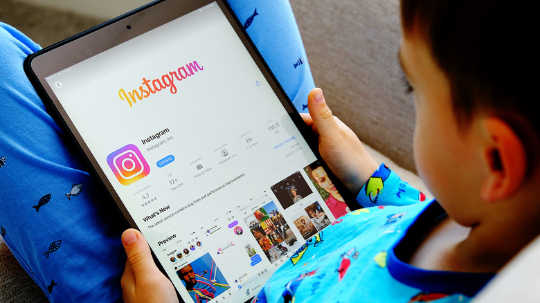 Child with tablet show Instagram