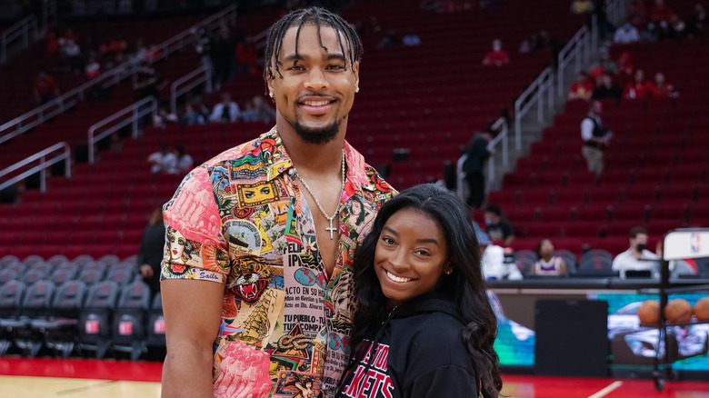 Simone Biles and Jonathan Owens smiling 