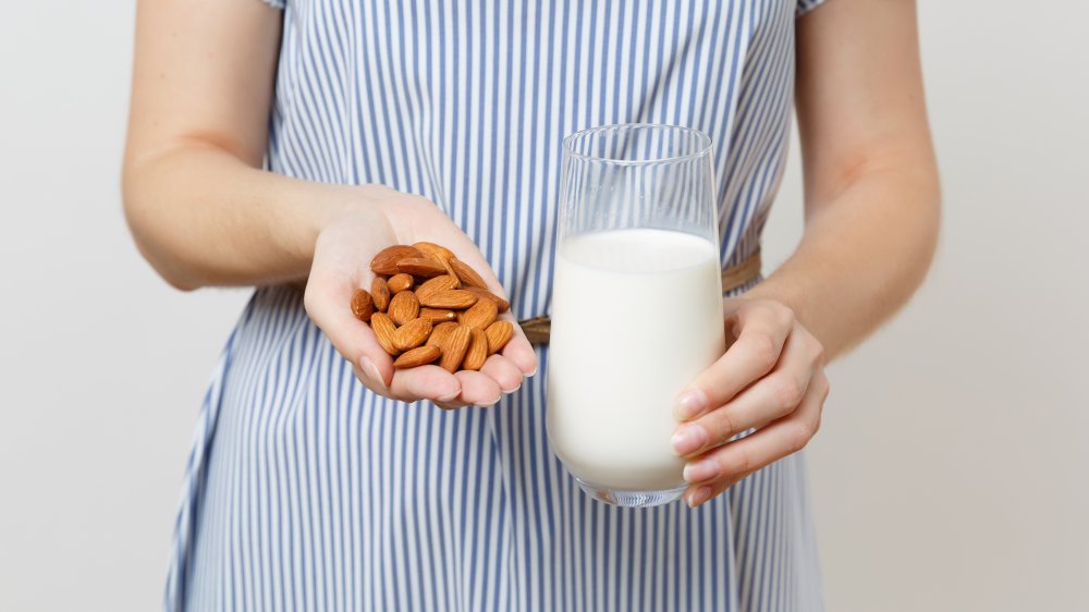 Woman with almond milk
