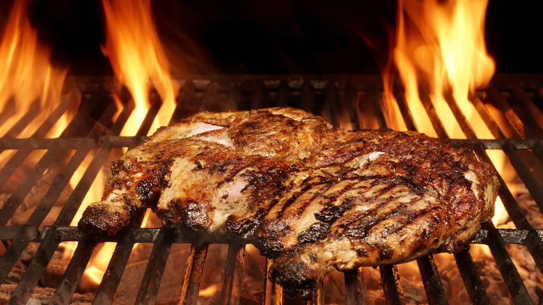 Chicken roasting on a grill