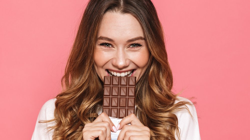 woman eating chocolate