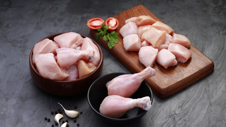 Raw chicken on a cutting board 