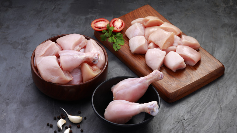 Raw chicken on a cutting board 