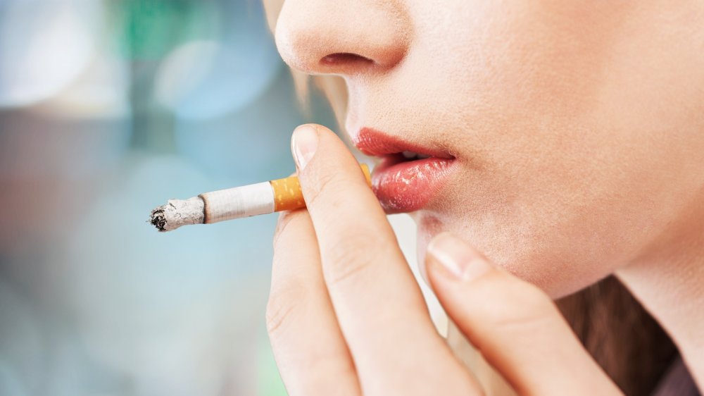 woman smoking a cigarette