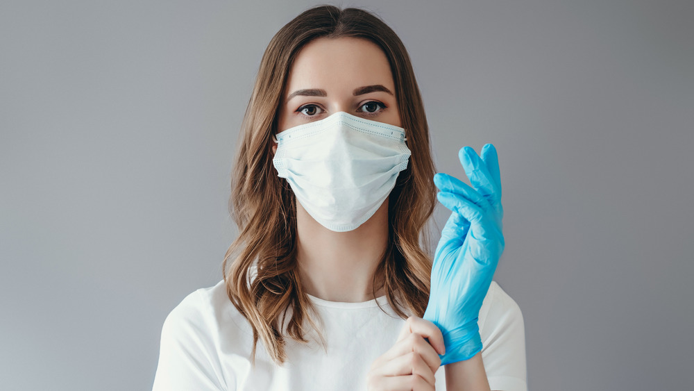 Woman adjusting her gloves