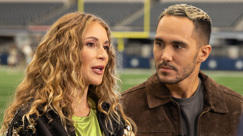 Carlos PenaVega looking at Alexa PenaVega as she speaks.