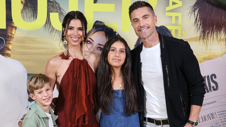 Roselyn Sánchez and Eric Winter pose with their two children, Dylan and Sebella.