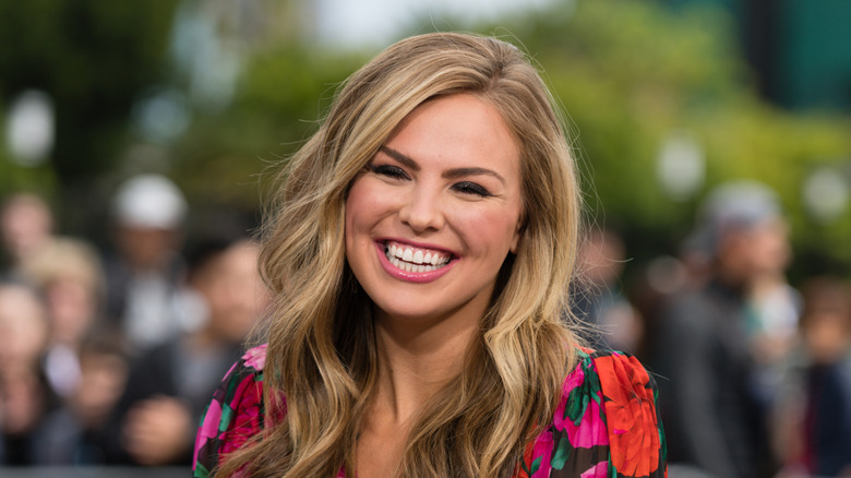 Hannah Brown smiling on Extra in 2019