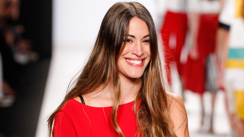 Korina Emmerich smiling at Mercedes-Benz Fashion Week in 2015
