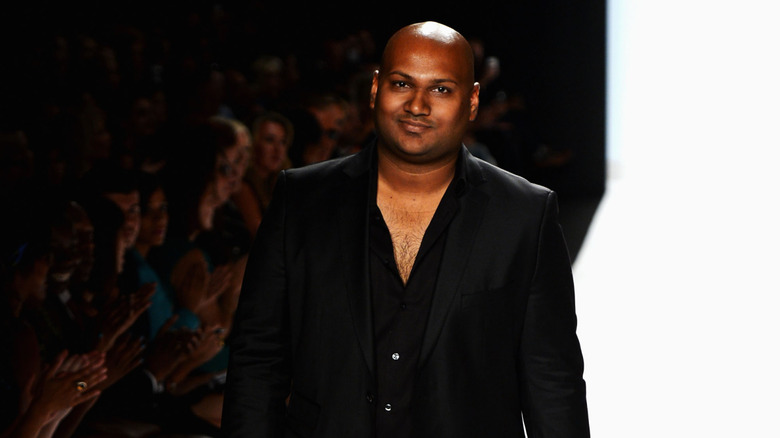 Ven Budhu walking down the runway at Mercedes-Benz Fashion Week