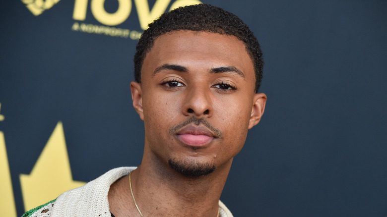 Diggy Simmons posing at an event