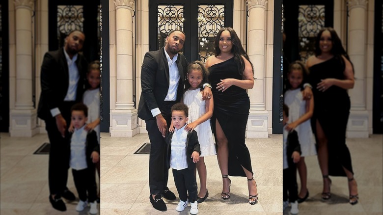 JoJo Simmons posing with his wife and kids