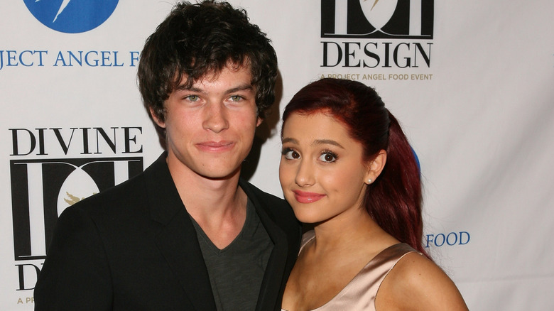 Ariana Grande and Graham Phillips posing at an event