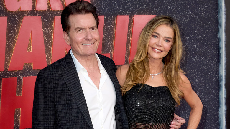 Charlie Sheen and Denise Richards smiling