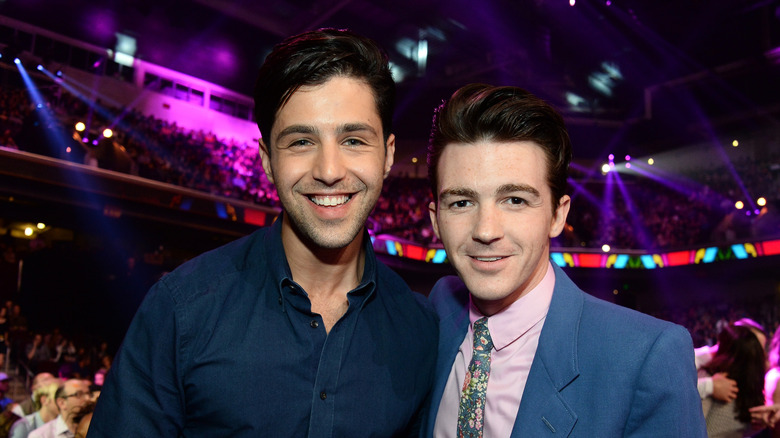 Drake Bell and Josh Peck posing for photos