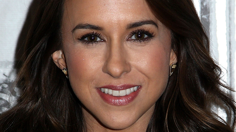 lacey chabert posing with styled hair