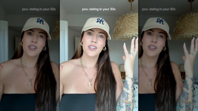 A screenshot of a TikTok of Chelsea Blackwell wearing a cap
