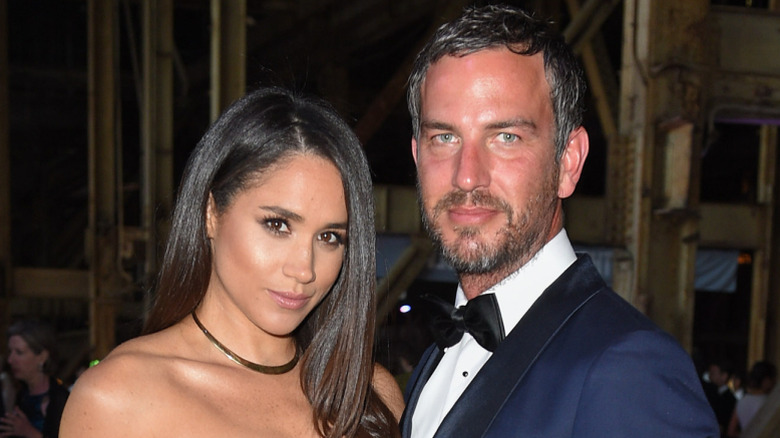 Meghan Markle and Markus Anderson posing together in 2016